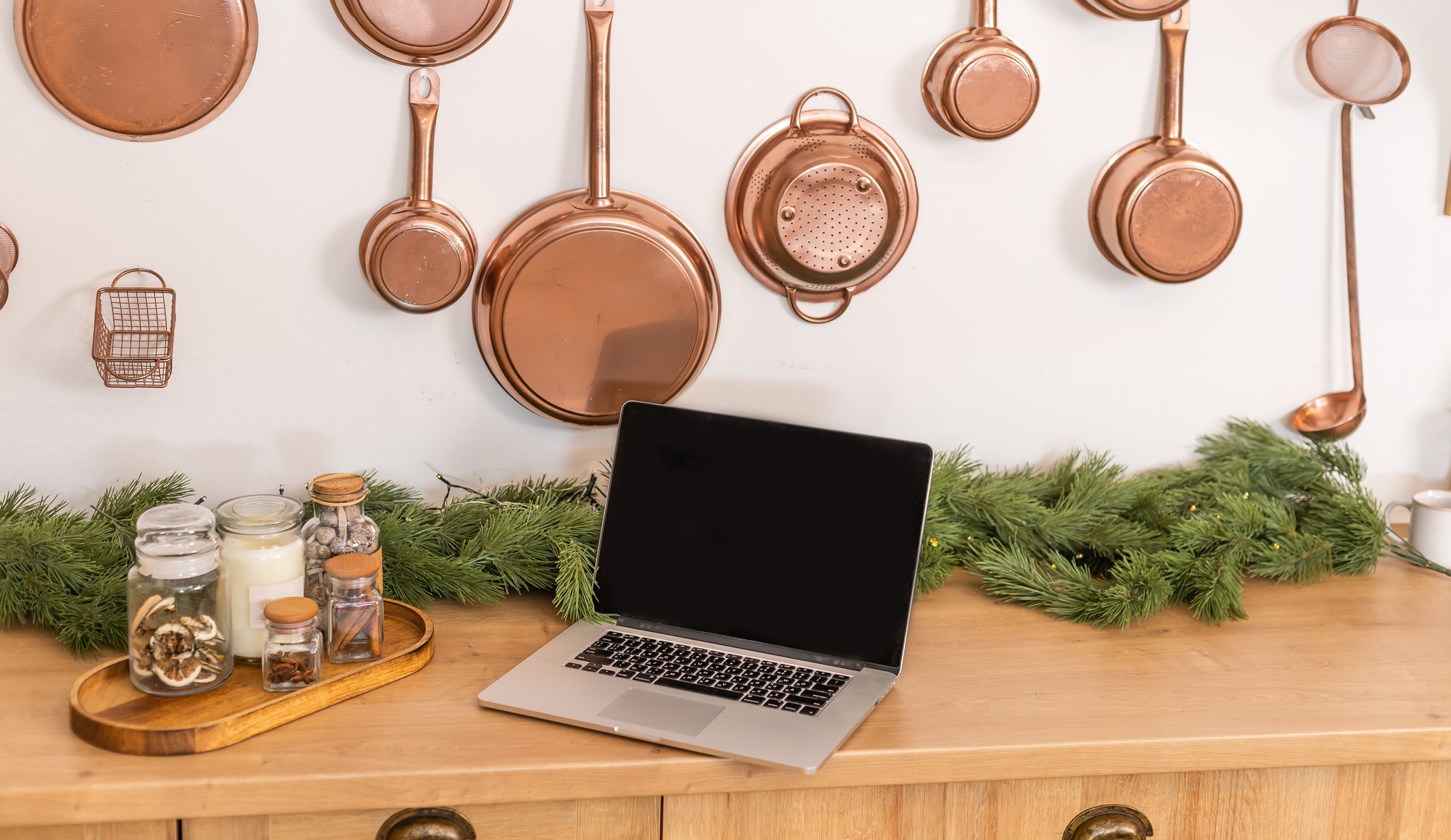 Studio kitchen with wooden counter and utensils